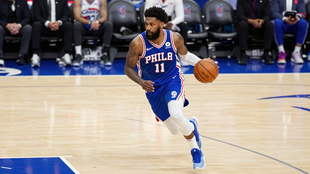 Tyrese Maxey dribbling basketball for Philadelphia 76ers